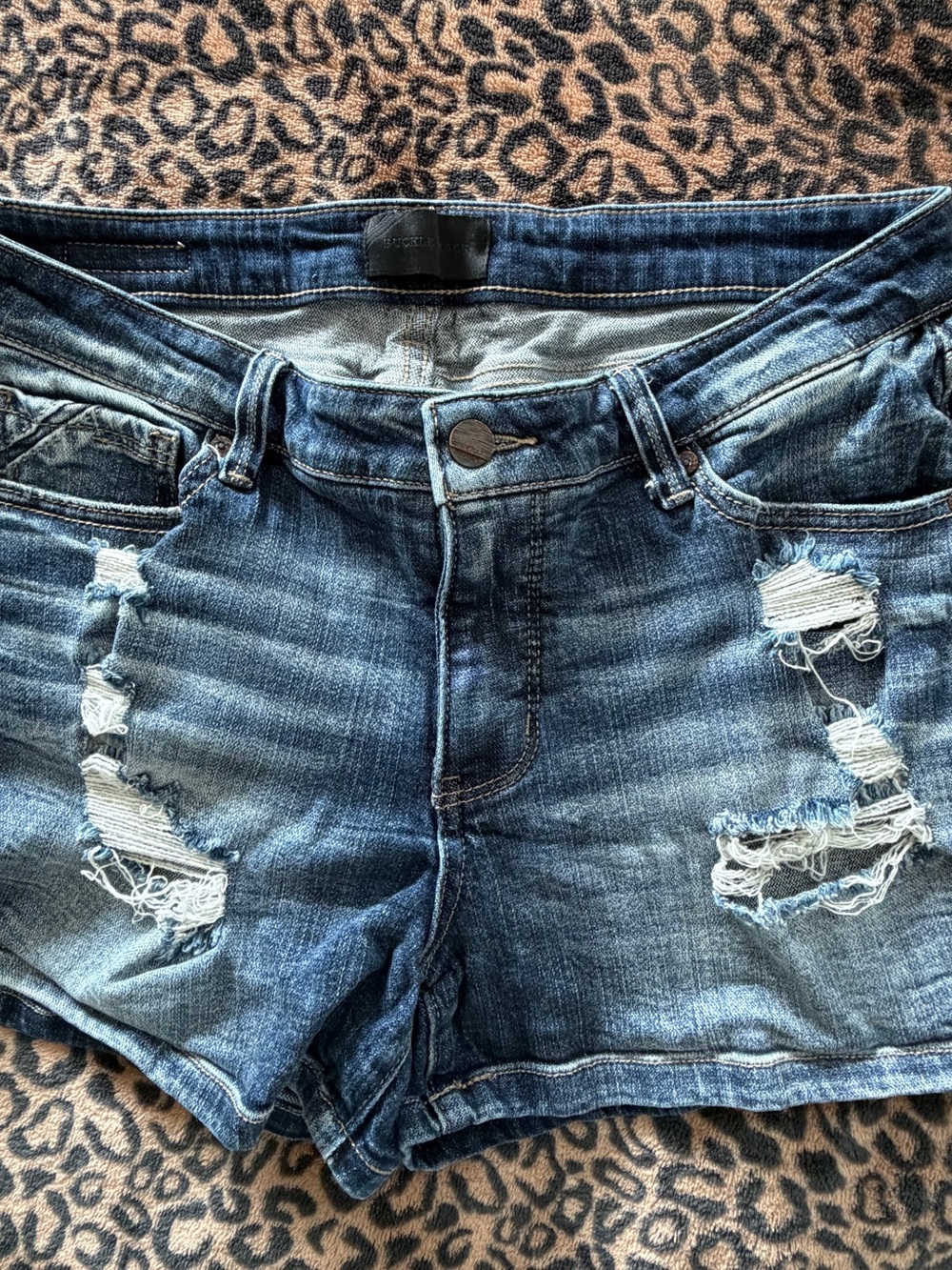 Buckle Women’s Distressed Dark Blue Denim Shorts